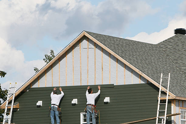 Professional Siding technician working in Marion, IL